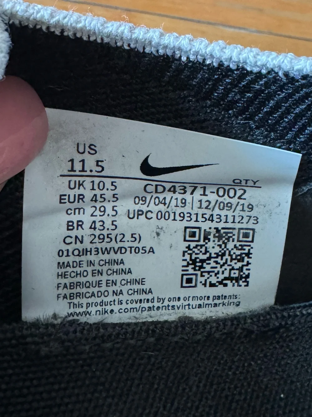 Nike Men's React Flyknit Black and White Running Shoes